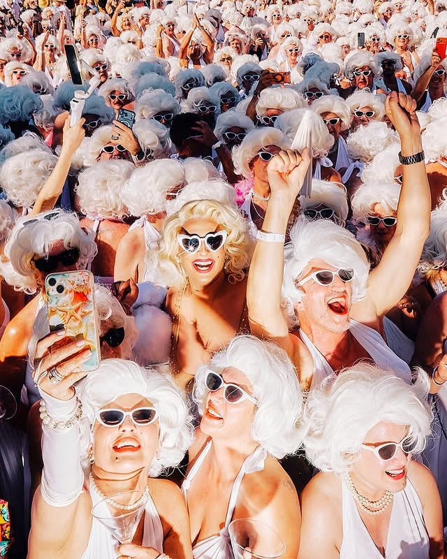 To celebrate Marilyn Monroe's 100th birthday, 1,037 fans came together to dress as the screen legend in downtown Palm Springs, beneath her giant statue.In doing so, they set a Guinness World Record in the very place where her career began. Palm Springs — whose identity is inextricably linked with the star — likes to claim Marilyn Monroe, born Norma Jeane Mortensen, and the feeling was mutual.Participants arrived with Marilyn handbags, Marilyn necklaces, Marilyn earrings, Marilyn umbrellas and enough red lipstick to supply the entire city. Blonde wigs and white dresses were provided by Palm Springs Pride, the organizers of the citywide birthday party. Though all the wigs were the same, no one appeared to be celebrating the same Marilyn Monroe.At the link in our bio, read about what the cinematic legend means to her fans and see more photos from the record-breaking event. Visuals by @francesca.forquet by @nytstyle