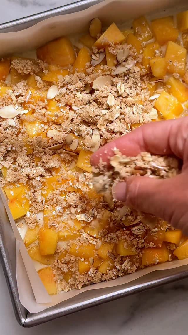 PEACH PIE CRUMB BARS! 🍑☀️⬇️
⠀⠀⠀⠀⠀⠀⠀⠀⠀
You can use fresh or frozen peaches (thaw if using frozen!) Comment SEND and we can dm you the full recipe. Grab these ingredients:
⠀⠀⠀⠀⠀⠀⠀⠀⠀
Crust & Topping
-1 cup (125g) all-purpose flour (spooned & leveled)
-1/2 cup (43g) + 1 Tbsp old-fashioned whole rolled oats, divided
-1/3 cup (67g) packed light or dark brown sugar
-1 teaspoon ground cinnamon
-1/8 teaspoon salt
-10 Tablespoons (142g) unsalted butter, cold and cubed
-optional: 1/4 cup (about 20g) sliced almonds
⠀⠀⠀⠀⠀⠀⠀⠀⠀
Peach Filling
-1 large egg, cold
-1/2 cup (100g) granulated sugar
-1 and 1/2 Tablespoons (11g) all-purpose flour
-1 teaspoon pure vanilla extract or vanilla bean paste
-1/4 teaspoon almond extract
-1/2 teaspoon fresh lemon zest
-2 and 1/2 cups (about 400g) chopped fresh peach chunks
⠀⠀⠀⠀⠀⠀⠀⠀⠀
Vanilla Icing (Optional)
-1/2 cup (60g) confectioners’ sugar
-1 Tablespoon (15g/ml) heavy cream or milk
-1/2 teaspoon pure vanilla extract or vanilla bean paste
⠀⠀⠀⠀⠀⠀⠀⠀⠀
https://sallysbakingaddiction.com/peach-pie-crumb-bars/